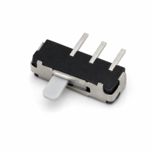 Miniature slide switch with a white rectangular actuator and three metal pins for through-hole mounting.