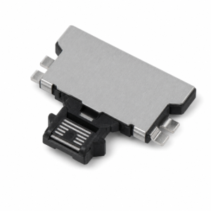 Metallic adapter module with a black plastic SATA-style connector at the bottom, likely a drive interface adapter